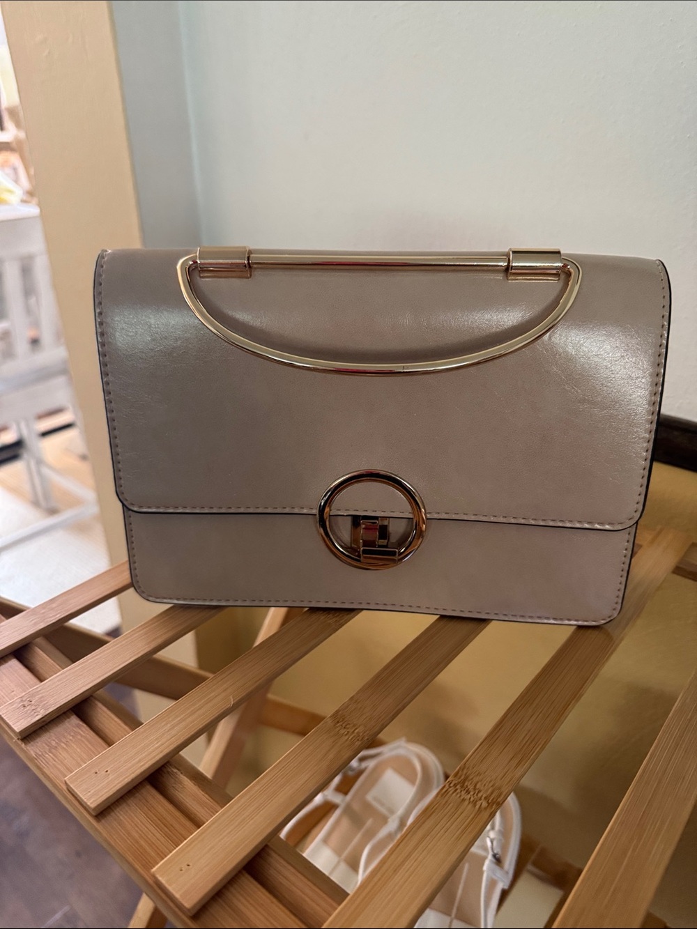 Sleek Taupe Crossbody Bag with Gold Accent